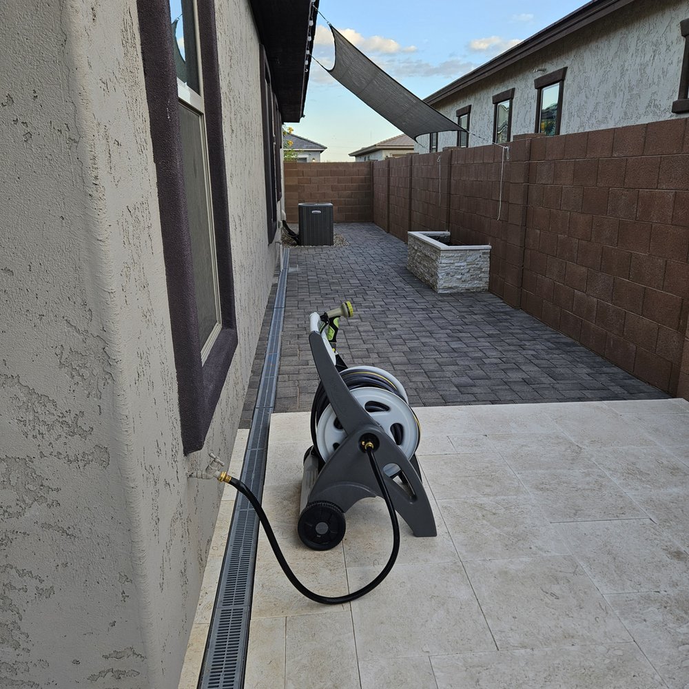 2Hernandez installed the drain through the travertine and pavers. Cannot even tell that they removed and cut the travertine/pavers to fit. 2Hernandez installed the drain through the travertine and pavers. Cannot even tell that they removed and cut the travertine/pavers to fit.