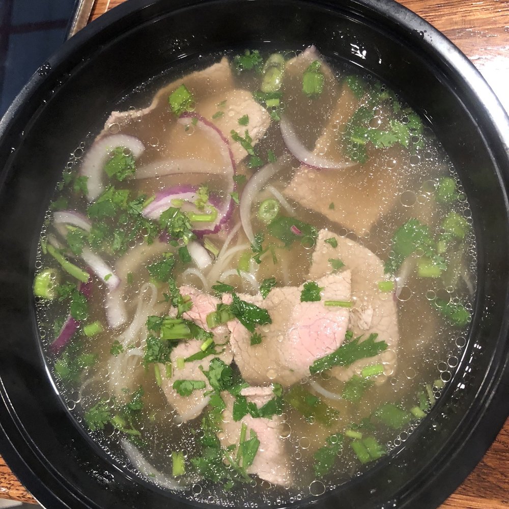 Pho King Express - a bowl of soup on a table - Vietnamese Near Me - Atlanta, Georgia Pho King Express - a bowl of soup on a table - Vietnamese Near Me - Atlanta, Georgia