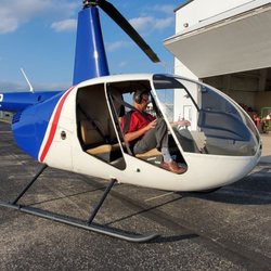 Freedom Air Helicopter Services - Pilot shutting down the helicopter after a flight.