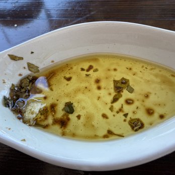 Bettolino Kitchen - The dipping olive oil vinaigrette after being - Italian Near Me - Redondo Beach, California Bettolino Kitchen - The dipping olive oil vinaigrette after being - Italian Near Me - Redondo Beach, California
