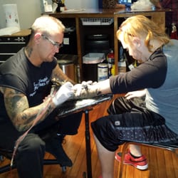 Body Graphics Inc Portside Parlor - Mikey getting ink done by Scott Musick