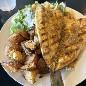 Bluesalt Fish Grill - Branzino plate ( chipotle butter seasoning/with Caesar salad and rosemary potatos) - Seafood Near Me - Redondo Beach, California Bluesalt Fish Grill - Branzino plate ( chipotle butter seasoning/with Caesar salad and rosemary potatos) - Seafood Near Me - Redondo Beach, California