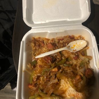 Spice County - a container of food with a spoon in it - Indian Near Me - Tucson, Arizona