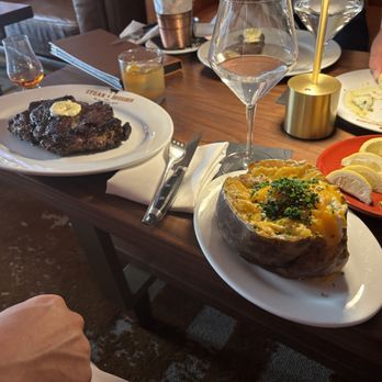 Steak & Bourbon - Ribeye and colossal potato - Steakhouses Near Me - Louisville, Kentucky Steak & Bourbon - Ribeye and colossal potato - Steakhouses Near Me - Louisville, Kentucky
