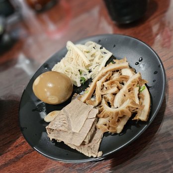 Shan Shan Noodles - a plate of food on a table - Chinese Near Me - Parsippany, New Jersey Shan Shan Noodles - a plate of food on a table - Chinese Near Me - Parsippany, New Jersey