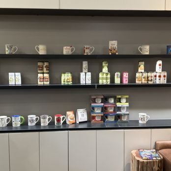 It’s a Grind Coffee House - The wall of adorable cute mugs and other gifts for family and friends. - Coffee & Tea Near Me - Pleasanton, California It’s a Grind Coffee House - The wall of adorable cute mugs and other gifts for family and friends. - Coffee & Tea Near Me - Pleasanton, California