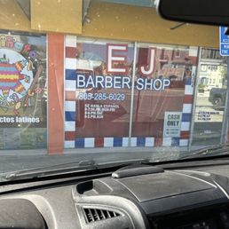 Front of barber shop.