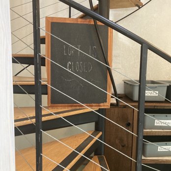 Cafe Wylde - Signage on the spiral stairs announcing the "LOFT IS CLOSED" - Cafes Near Me - Everett, Washington