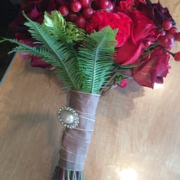 Beautiful bride bouquet with seasonal reds