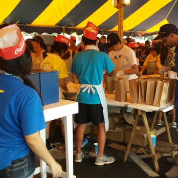 Punahou Carnival - The hard working people serving up the malasada's! - Festivals Near Me - Honolulu, Hawaii Punahou Carnival - The hard working people serving up the malasada's! - Festivals Near Me - Honolulu, Hawaii