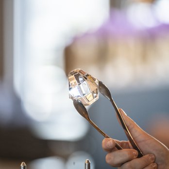 The Wilde on 27 - a person holding a fork and knife - Wine Bars Near Me - Calgary, Alberta The Wilde on 27 - a person holding a fork and knife - Wine Bars Near Me - Calgary, Alberta
