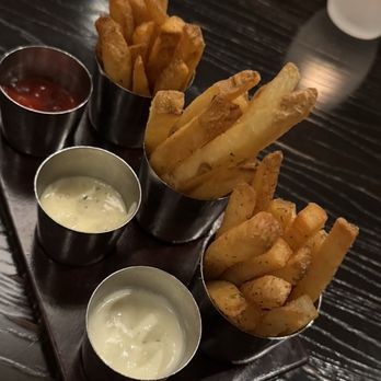 Bourbon Steak Orange County - fries with three different dipping sauces and seasonings, complements of the chef. Always served first. - Steakhouses Near Me - Dana Point, California Bourbon Steak Orange County - fries with three different dipping sauces and seasonings, complements of the chef. Always served first. - Steakhouses Near Me - Dana Point, California