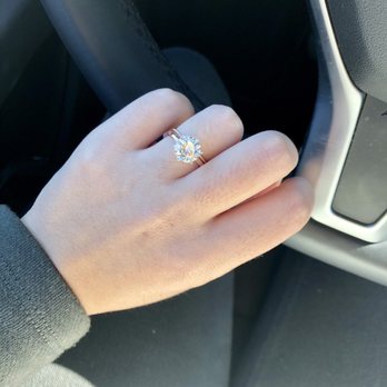 Kevin's Gems - 8mm Moissanite on 1.8mm plain rose gold band, with white gold prongs, size 5 finger - Jewelry Near Me - Los Angeles, California Kevin's Gems - 8mm Moissanite on 1.8mm plain rose gold band, with white gold prongs, size 5 finger - Jewelry Near Me - Los Angeles, California