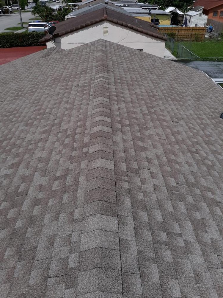 Slide of Alex Roofing