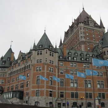 Vieux-Quebec - Old Quebec - A view of Chateau Frontenac with its UNESCO flags flying, near the eastern entrance to Terrasse Dufferin. - Landmarks & Historical Buildings Near Me - Quebec City, Quebec Vieux-Quebec - Old Quebec - A view of Chateau Frontenac with its UNESCO flags flying, near the eastern entrance to Terrasse Dufferin. - Landmarks & Historical Buildings Near Me - Quebec City, Quebec