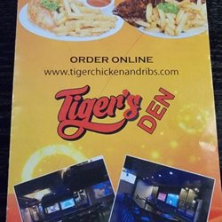 Tiger Chicken & Ribs - The menu cover.