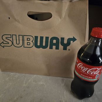 Subway - a bottle of coke next to a bag - Sandwiches Near Me - Lombard, Illinois Subway - a bottle of coke next to a bag - Sandwiches Near Me - Lombard, Illinois