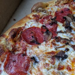 Giovanni’s Pizza & Pasta - Large. Half Hawaiian, Half Pepperoni with mushrooms. Extra cheese.