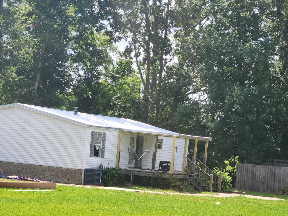 Slide of Flournoy and Sons Roofing