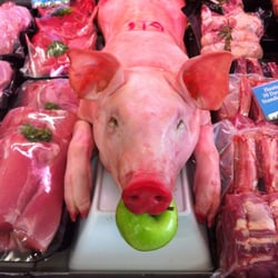TJ's Quality Meats - Pig eating an Apple ;)
