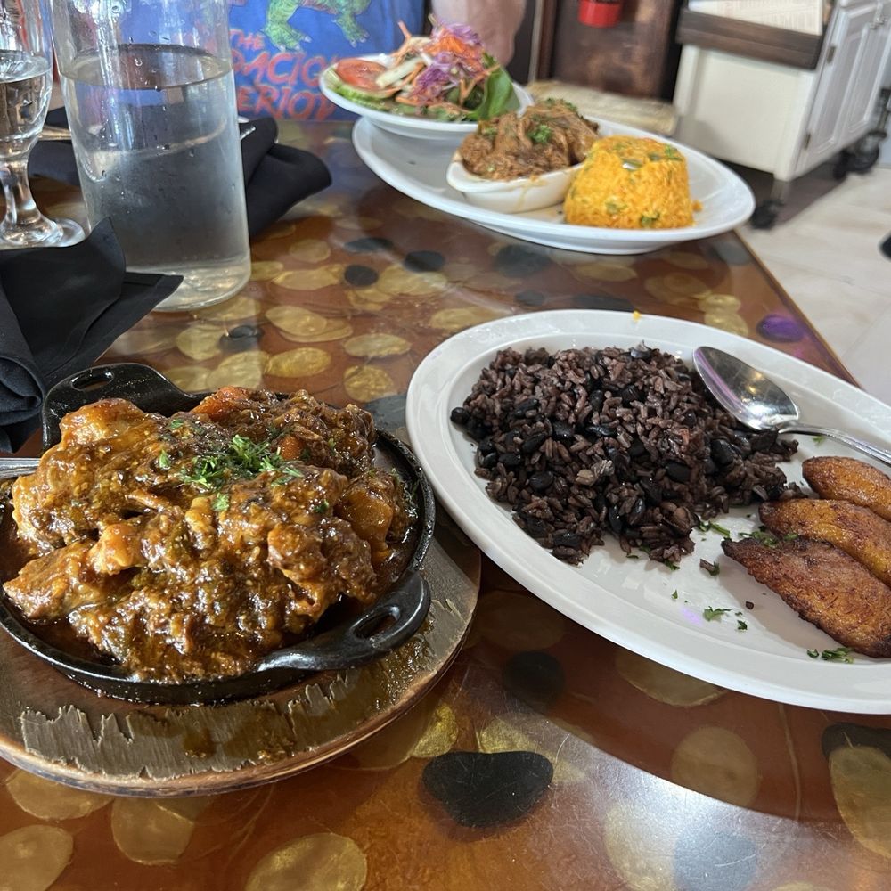 Bella Cuba - Oxtail stew with black bean rice and fried sweet plantains - Cuban Near Me - Miami Beach, Florida Bella Cuba - Oxtail stew with black bean rice and fried sweet plantains - Cuban Near Me - Miami Beach, Florida