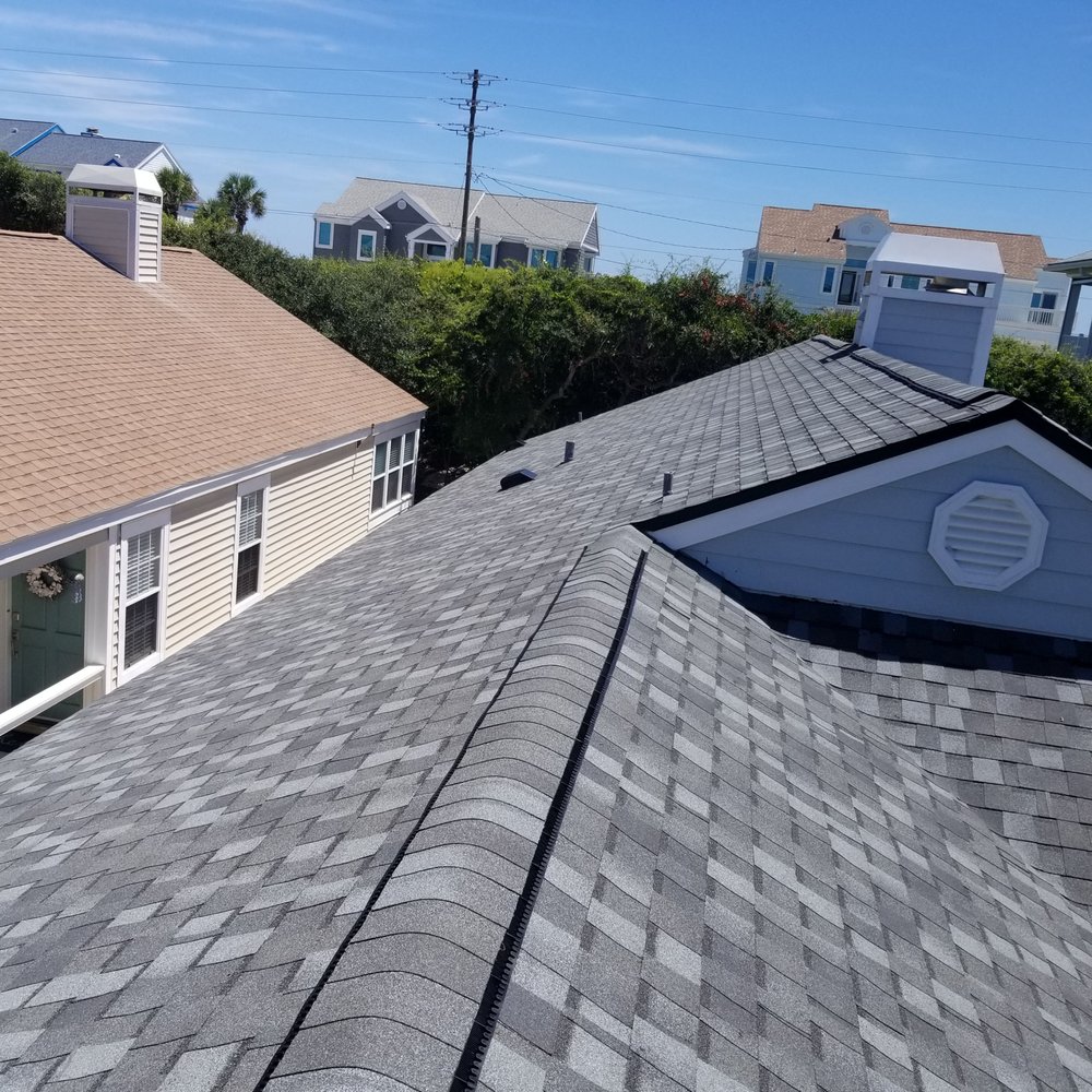 Slide of Elsa Roofing Company