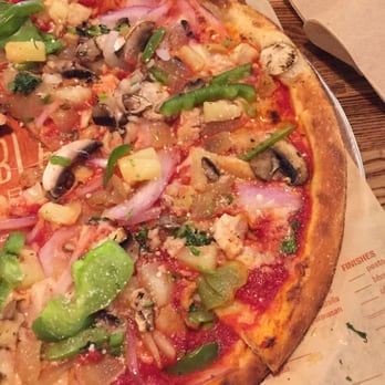 Blaze Pizza - Build your own pizza. Very thin and crispy crust. Chicken, garlic, onion, cilantro, pineapple, and bell pepper. - Salad Near Me - Orange, California