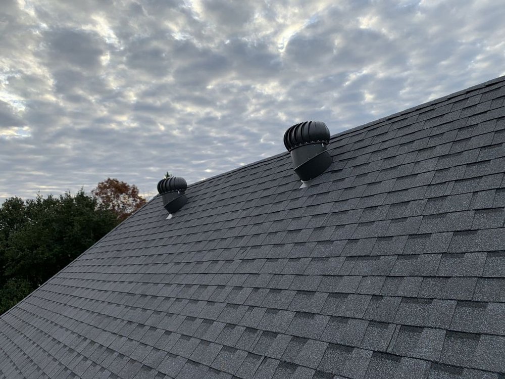 Slide of Pelican Roofing Company