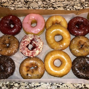 Sarah Donuts - Left to Right: Red velvet glaze, strawberry, glaze, red velvet glaze, blueberry glaze, red velvet with cream cheese frosting - Donuts Near Me - Suwanee, Georgia Sarah Donuts - Left to Right: Red velvet glaze, strawberry, glaze, red velvet glaze, blueberry glaze, red velvet with cream cheese frosting - Donuts Near Me - Suwanee, Georgia