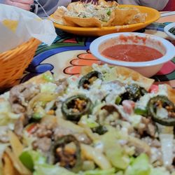 Los Arcos - Fajita taco salads with grilled seasoned jalapeños. Chips and salsa