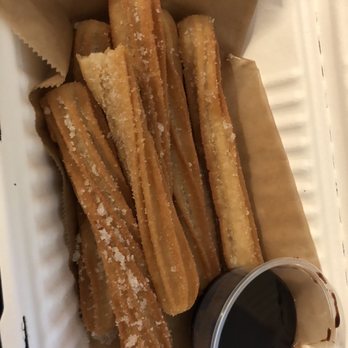 Pastelitos Chips - One order of churros! Perfectly crunchy and delish! And a little chocolate sauce on the side. - Venezuelan Near Me - Kissimmee, Florida