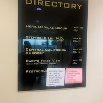 Central California Surgery - February 13, 2024 Impossible to tell what these pieces of pink & white paper are doing on this professional sign. It looks unprofessional. - Weight Loss Centers Near Me - Modesto, California