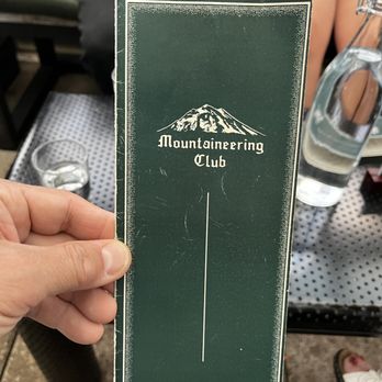 The Mountaineering Club - Menu cover with logo - Cocktail Bars Near Me - Seattle, Washington The Mountaineering Club - Menu cover with logo - Cocktail Bars Near Me - Seattle, Washington