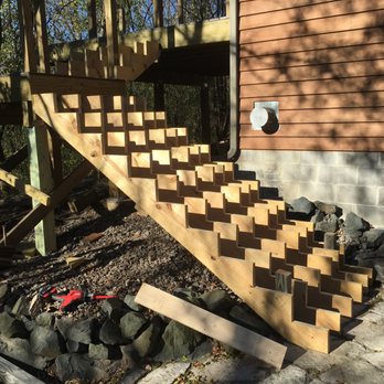 The Happy Servant - Custom cut large deck staircase. - General Contractors Near Me - Hudson, Wisconsin The Happy Servant - Custom cut large deck staircase. - General Contractors Near Me - Hudson, Wisconsin