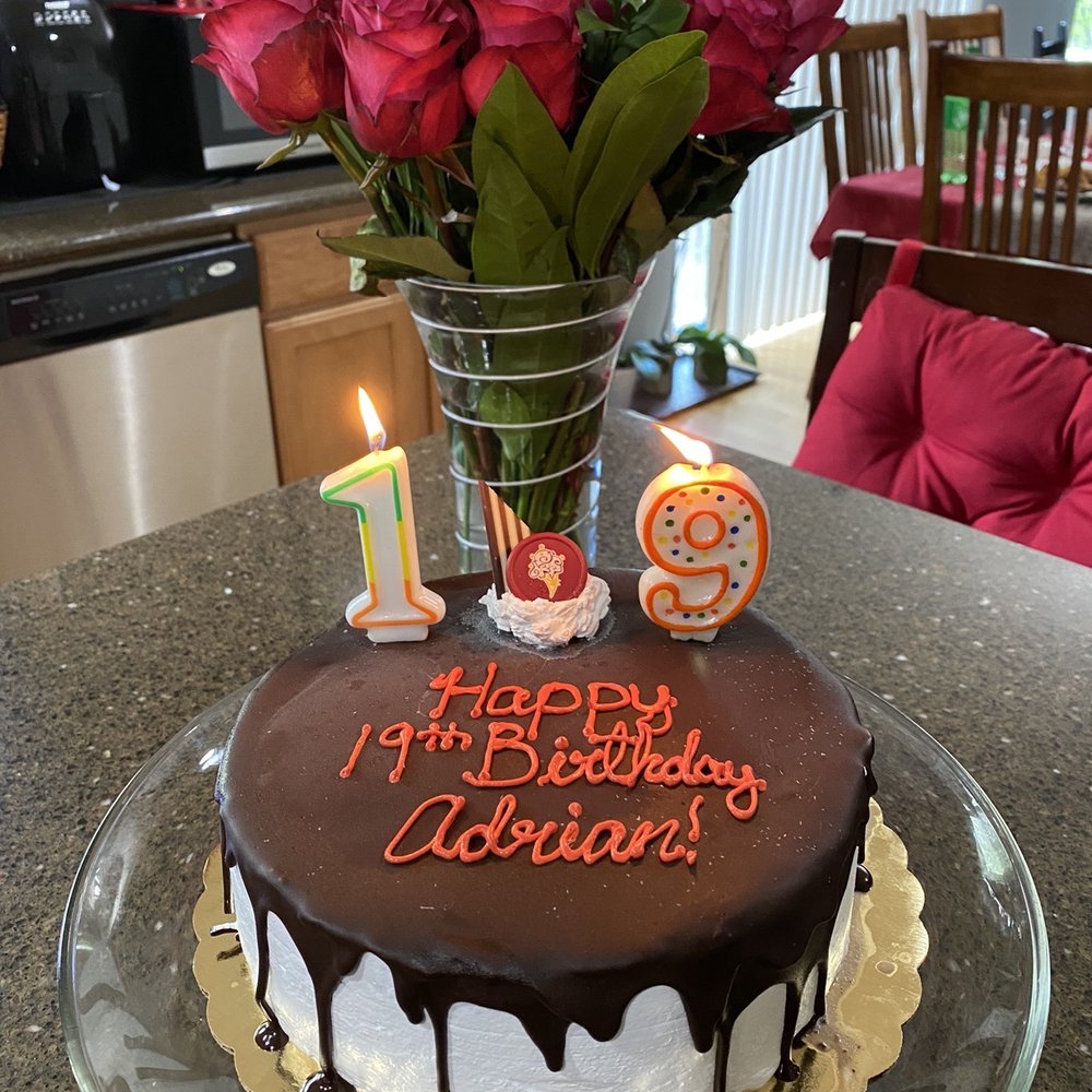 Cold Stone Creamery - a birthday cake with candles and flowers - Ice Cream & Frozen Yogurt Near Me - Covington, Washington Cold Stone Creamery - a birthday cake with candles and flowers - Ice Cream & Frozen Yogurt Near Me - Covington, Washington