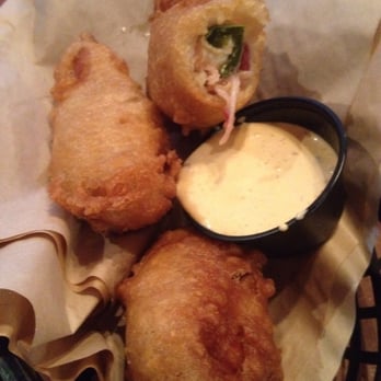 Moses Rose's Hideout - Armadillo eggs: jalapeño and cream cheese wrapped in thick cut bacon, then battered and deep fried. - Barbeque Near Me - San Antonio, Texas Moses Rose's Hideout - Armadillo eggs: jalapeño and cream cheese wrapped in thick cut bacon, then battered and deep fried. - Barbeque Near Me - San Antonio, Texas