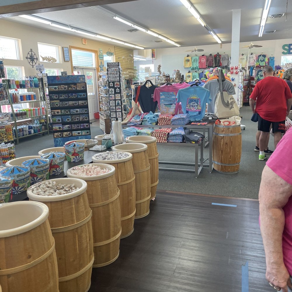 Forbes Candies - a woman standing in a store - Candy Stores Near Me - Nags Head, North Carolina