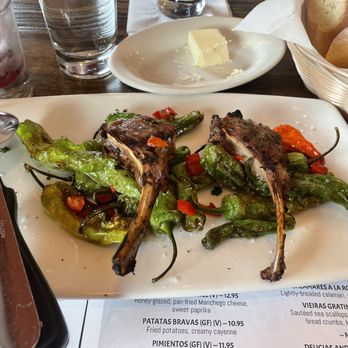 La Tasca Restaurant - Cordero (2 lamb chops with padron peppers) - EXCELLENT - Tapas Bars Near Me - Arlington Heights, Illinois La Tasca Restaurant - Cordero (2 lamb chops with padron peppers) - EXCELLENT - Tapas Bars Near Me - Arlington Heights, Illinois