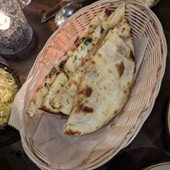 Saffron Modern Indian Dining - Garlic and fig naan (2 orders - 2 pieces per order) - Indian Near Me - Milwaukee, Wisconsin Saffron Modern Indian Dining - Garlic and fig naan (2 orders - 2 pieces per order) - Indian Near Me - Milwaukee, Wisconsin