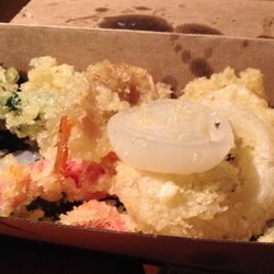Toro Sushiya - Slab of onion with tempura removed.