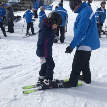 Perfect North Slopes - Starting her first lesson. How to put on skis - Ski Resorts Near Me - Lawrenceburg, Indiana Perfect North Slopes - Starting her first lesson. How to put on skis - Ski Resorts Near Me - Lawrenceburg, Indiana