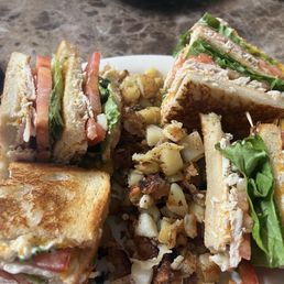 Petes club. Triple-decker with roasted turkey, bacon, cheddar and jack cheese, tomato, lettuce, and mayo on sourdough. Petes club. Triple-decker with roasted turkey, bacon, cheddar and jack cheese, tomato, lettuce, and mayo on sourdough.