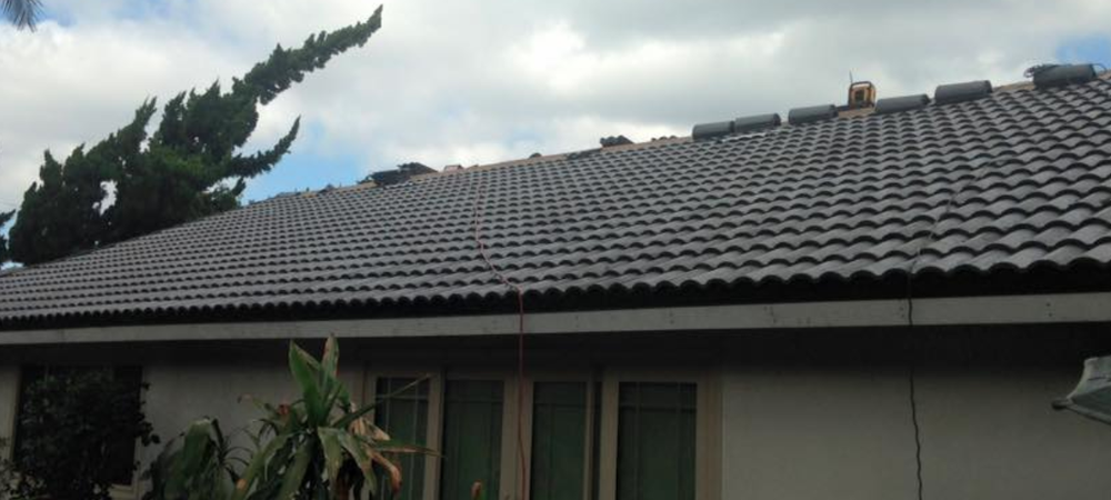 Slide of Douglas Cote Roofing