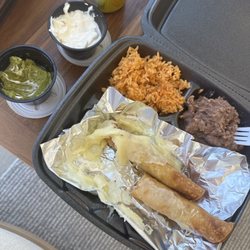 Rolled tacos, rice, beans