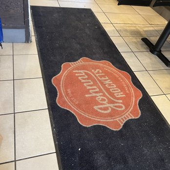 Johnny Rockets - the logo on the floor of a restaurant - Burgers Near Me - Tannersville, Pennsylvania Johnny Rockets - the logo on the floor of a restaurant - Burgers Near Me - Tannersville, Pennsylvania
