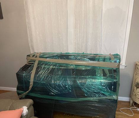 Piano Move - Moving a piano to its new home in CT. Wrapping it up to protect every part. Piano Move - Moving a piano to its new home in CT. Wrapping it up to protect every part.