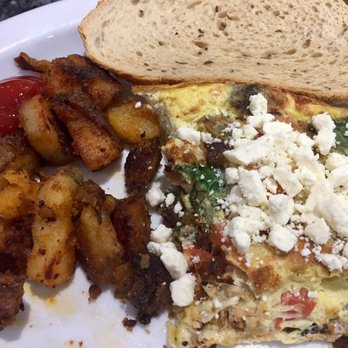 Zinger's Delicatessen - Split order of a 4 egg veggie omelette, with addictive home fries. - Delis Near Me - Boca Raton, Florida Zinger's Delicatessen - Split order of a 4 egg veggie omelette, with addictive home fries. - Delis Near Me - Boca Raton, Florida
