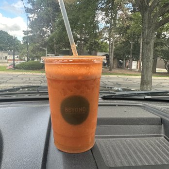 Beyond Juicery + Eatery - Orange, apple, Lemmon, and carrot. - Juice Bars & Smoothies Near Me - Grosse Pointe Woods, Michigan
