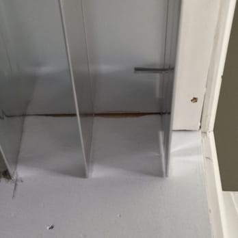 Blueprint NY Construction Group - a bathroom floor with white paint - General Contractors Near Me