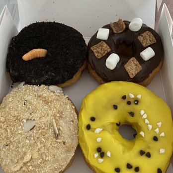 Donut Central & Fuelpresso - Clockwise from top left: Oreo Mud Pie, S'mores, Lemon Truffle and Key Lime - Donuts Near Me - Winter Park, Florida